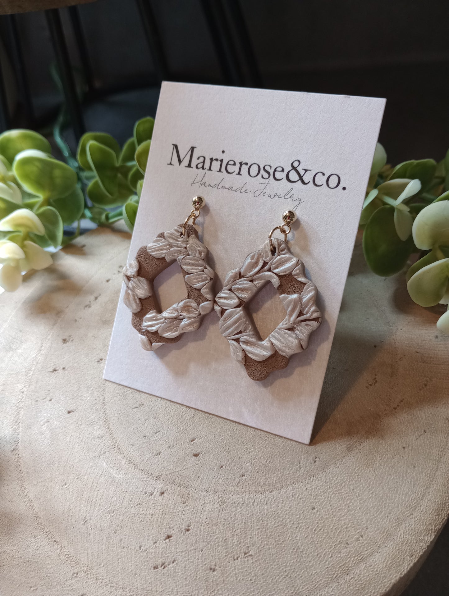 Tan floral diamond earrings